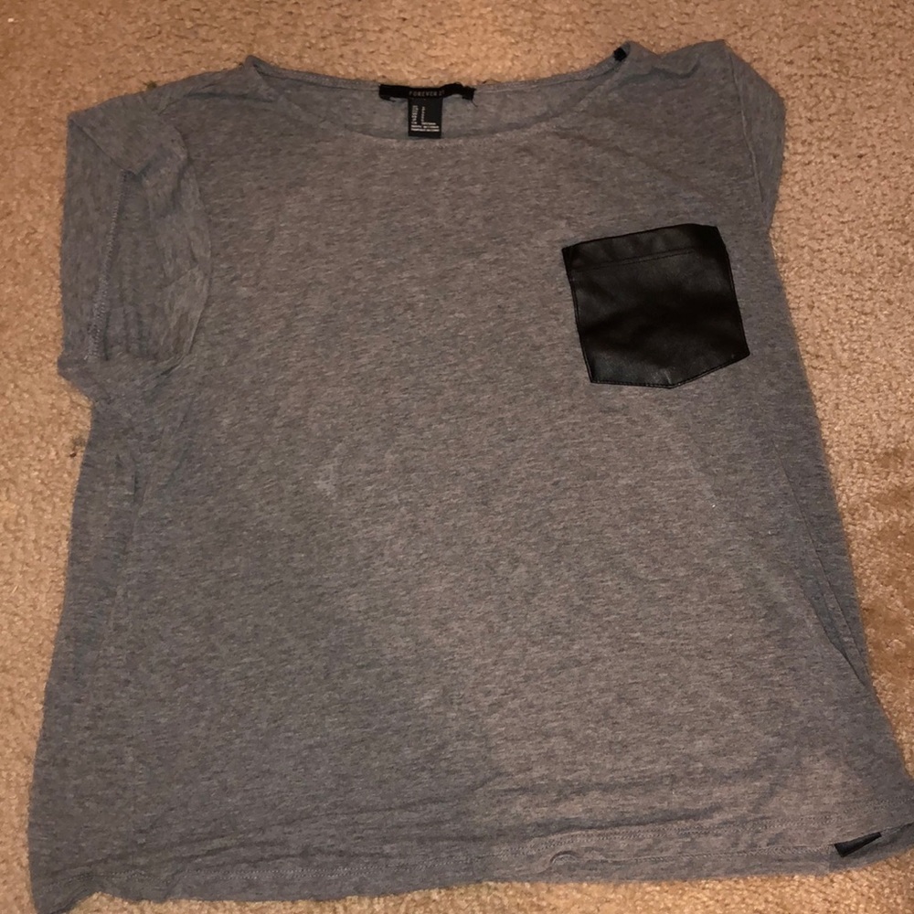 flowy gray top with leather pocket